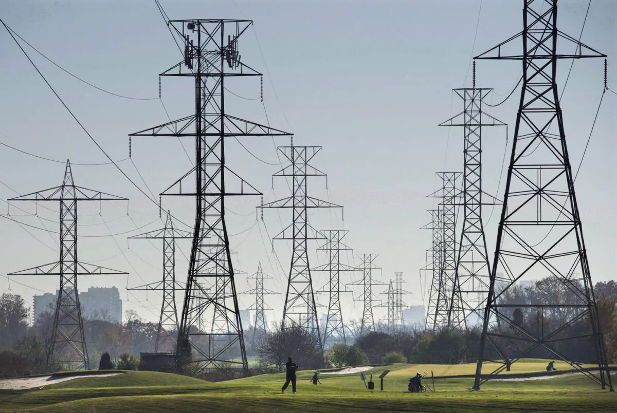Hydro towers are seen over a golf course in Toronto on Nov. 4, 2015. (The Canadian Press/Darren Calabrese)