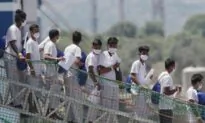 Hundreds of Migrants Rescued by MSF Charity Land in Sicily