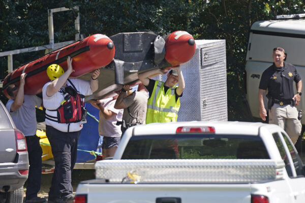 Rescue personnel stage along the Dan River