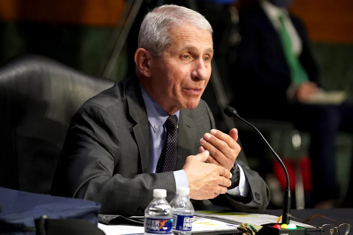 Dr. Anthony Fauci, director of the National Institute of Allergy and Infectious Diseases, arrives for a Senate Health, Education, Labor and Pensions Committee hearing to discuss the ongoing federal response to COVID-19 in Washington, on May 11, 2021. (Greg Nash/Pool/Getty Images)