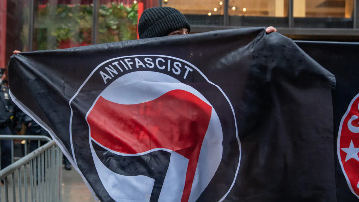 A person holds an Antifa flag in this file photo. (David Dee Delgado/Getty Images)