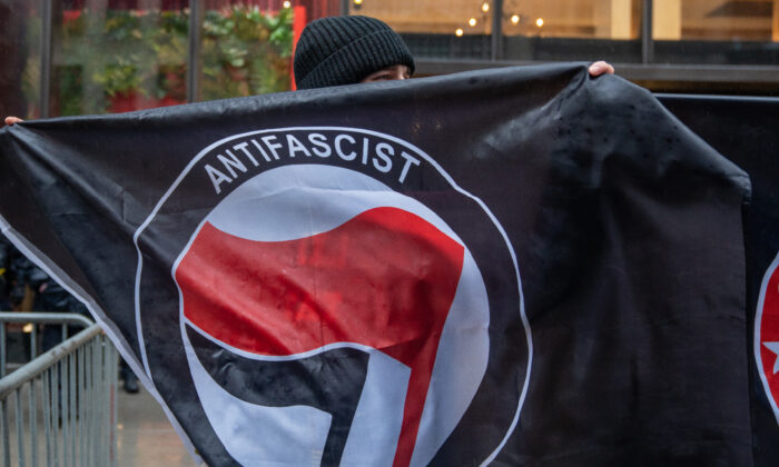 A person holds an Antifa flag in this file photo. (David Dee Delgado/Getty Images)