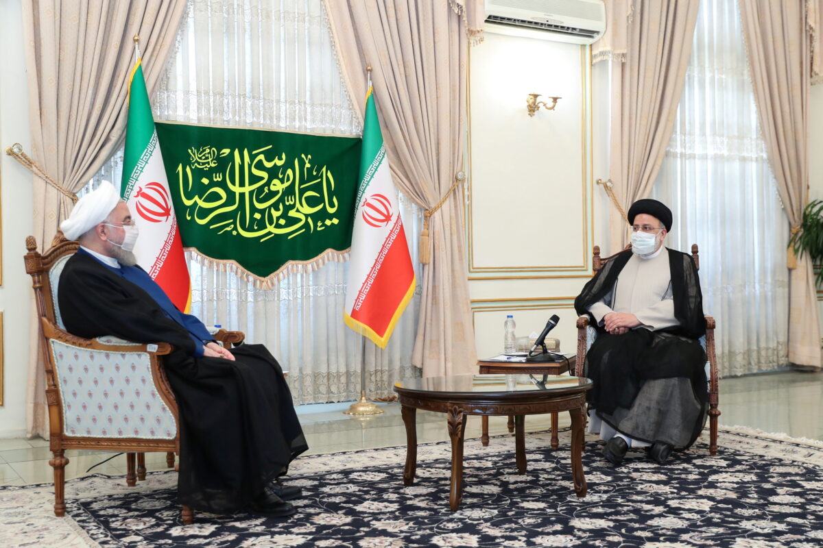 Iran's outgoing President Rouhani meets with the Iran's President-elect Raisi in Tehran