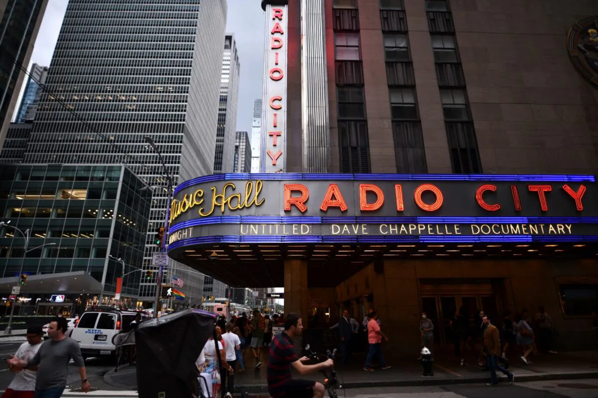 Radio City Music Hall's marquee advertises Dave Chappelle's untitled documentary during the closing night celebration for the 20th Tribeca Festival in New York City, on June 19, 2021. (Charles Sykes/Invision/AP)