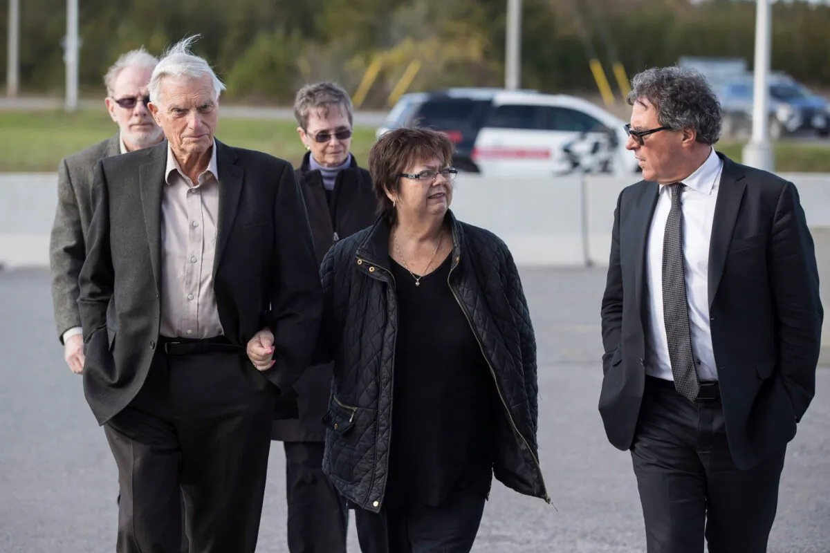 (L–R) Doug and Donna French, parents of murder victim Kristen French, with their lawyer Tim Danson after Paul Bernardo's parole hearing at Millhaven Institution in Bath, Ont., on Oct. 17, 2018. Bernardo was again denied parole on June 22, 2021. (The Canadian Press/Lars Hagberg)