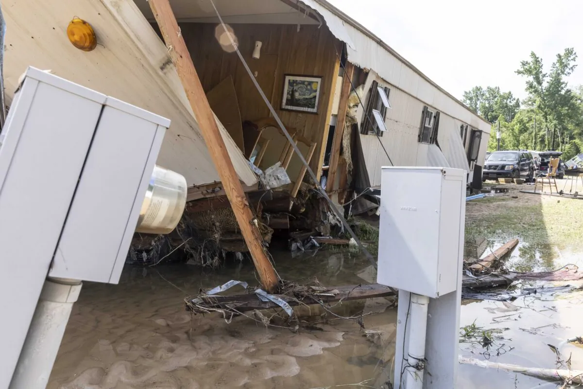 A home at lot 226 was destroyed by heavy flooding at 2823 Hunter Creek Road in Northport, Ala., on June 20, 2021. (Vasha Hunt/AP Photo)