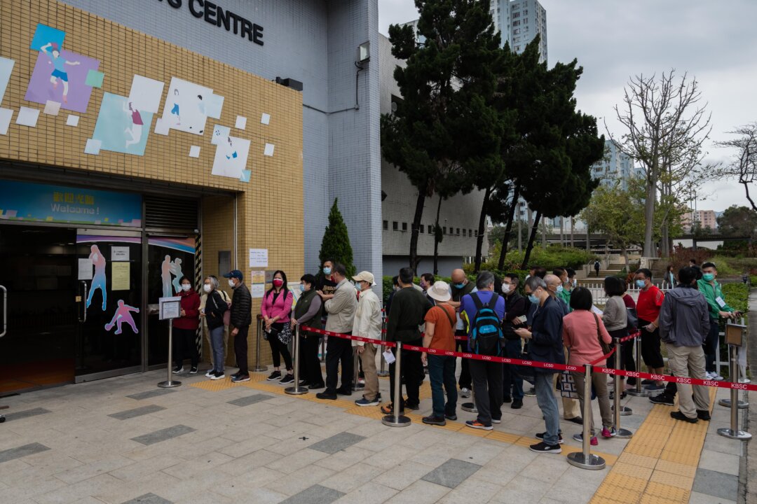 People line up at a community vaccination center administering the Sinovac COVID-19 vaccine in Hong Kong on Feb. 26, 2021. (Billy H.C. Kwok/Getty Images)