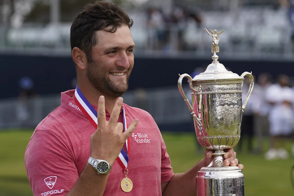 Jon Rahm, of Spain, holds the champions trophy after the final round of the U.S. Open Golf Championship, at Torrey Pines Golf Course in San Diego, Calif., on June 20, 2021. (Marcio Jose Sanchez/AP Photo)