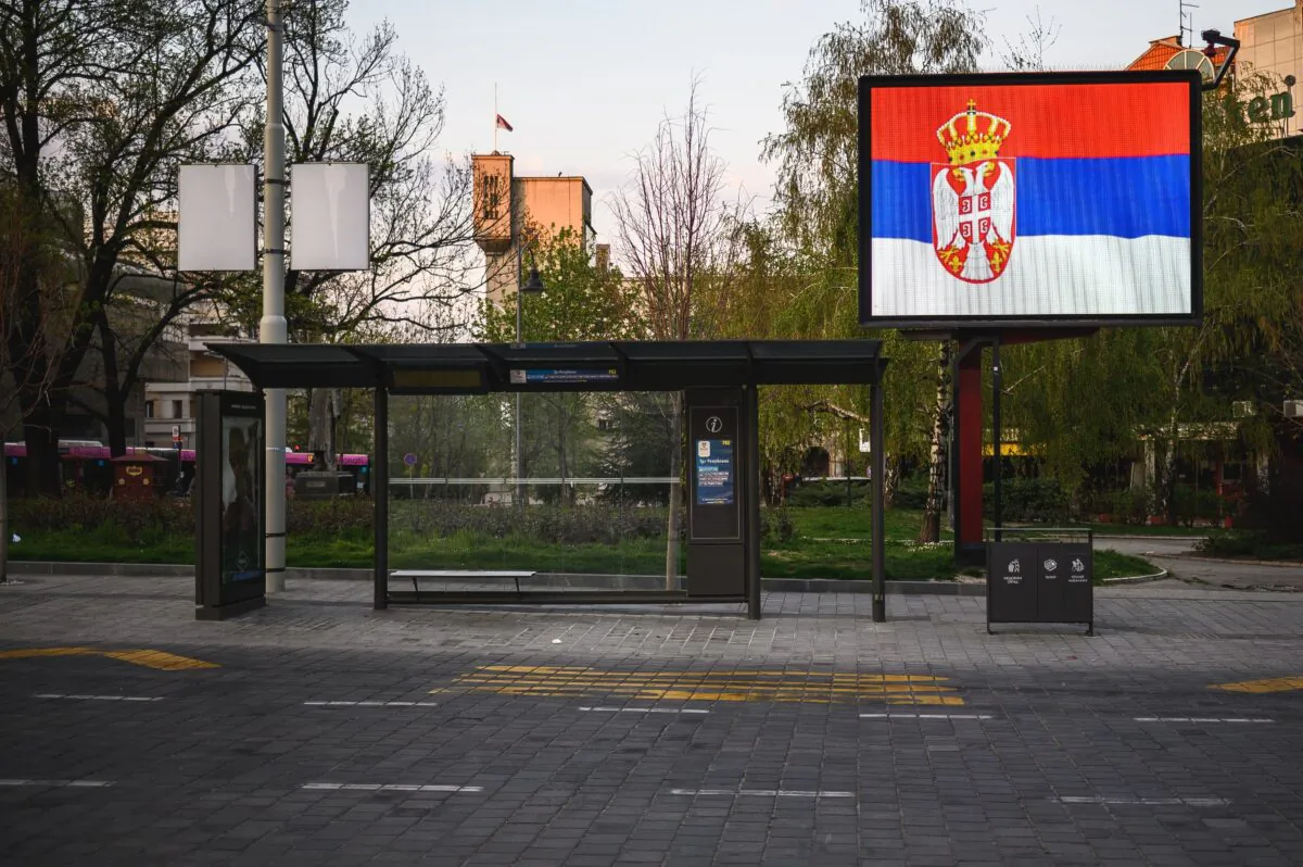The Serbian national flag displayed on a billboard in a file photo. (Andrej Isakovic/AFP via Getty Images)