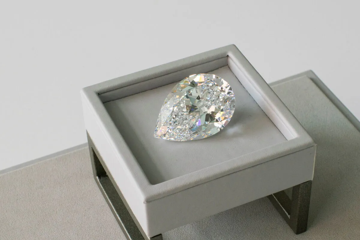 A rare pear-shaped D color flawless 100+ carat diamond is seen at Sotheby's in New York City,  on June 21, 2021. (Eduardo Munoz/Reuters)