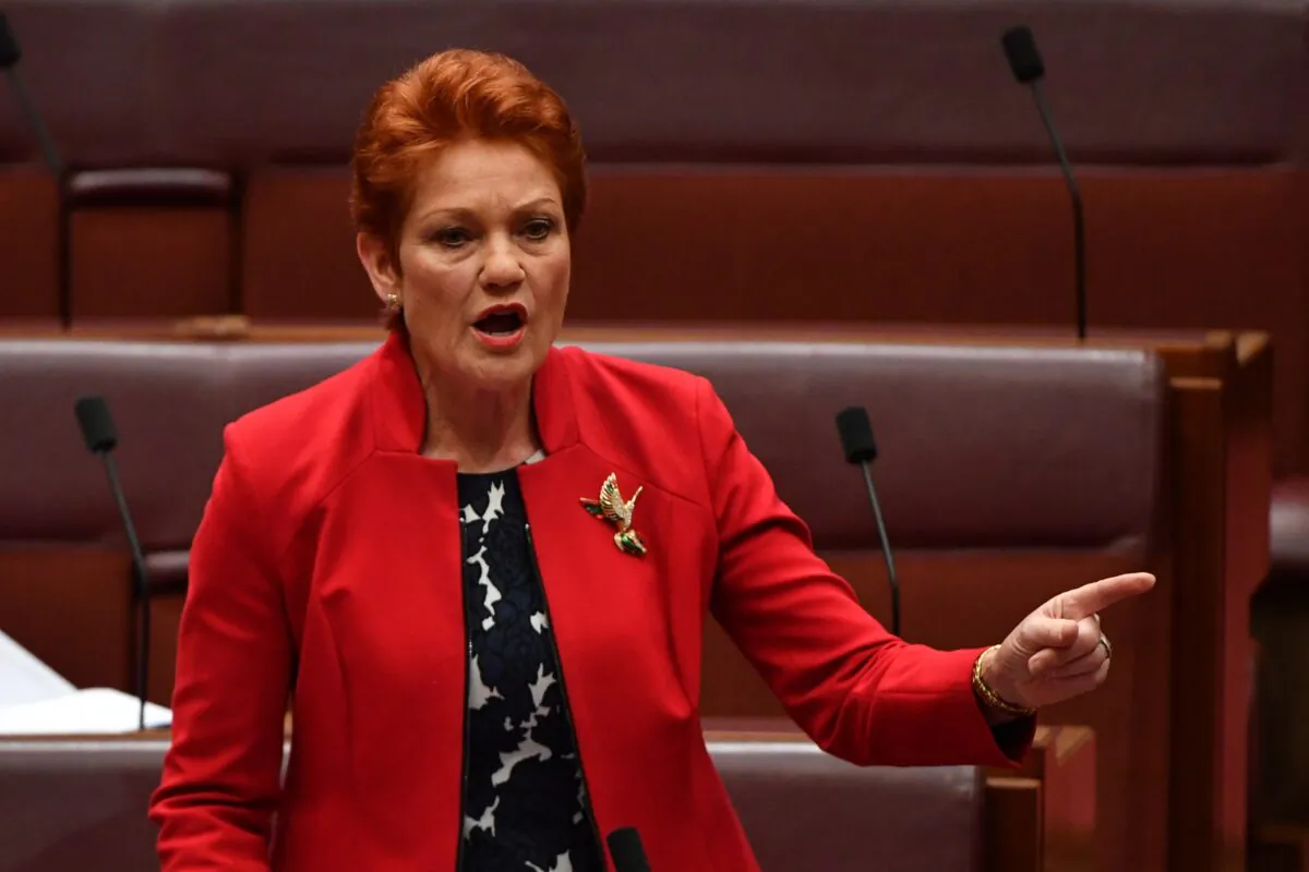 One Nation Senator Pauline Hanson in Senate chamber at Parliament House in Canberra, Australia on Dec. 2, 2019. (AAP Image/Mick Tsikas) 