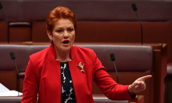 One Nation Senator Pauline Hanson in Senate chamber at Parliament House in Canberra, Australia on Dec. 2, 2019. (AAP Image/Mick Tsikas) 