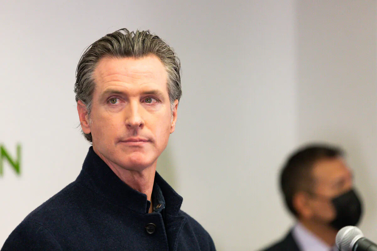 Governor Gavin Newsom speaks to reporters at AltaMed Urgent Care in Santa Ana, Calif., on March 25, 2021. (John Fredricks/The Epoch Times)