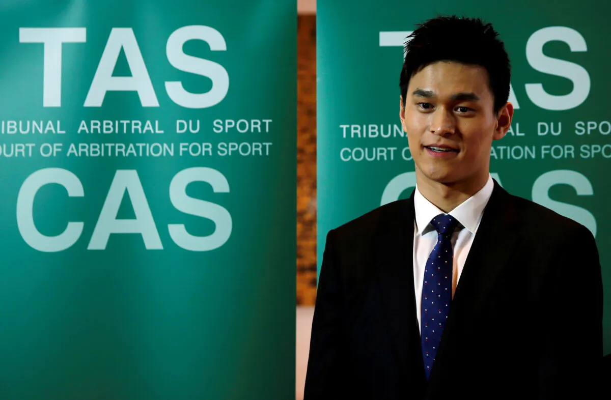 Chinese swimmer Sun Yang poses after a public hearing of the Court of Arbitration for Sport (CAS) at the Conference Centre of the Fairmont Le Montreux Palace, in Montreux, Switzerland, on Nov. 15, 2019. (Denis Balibouse/Reuters)