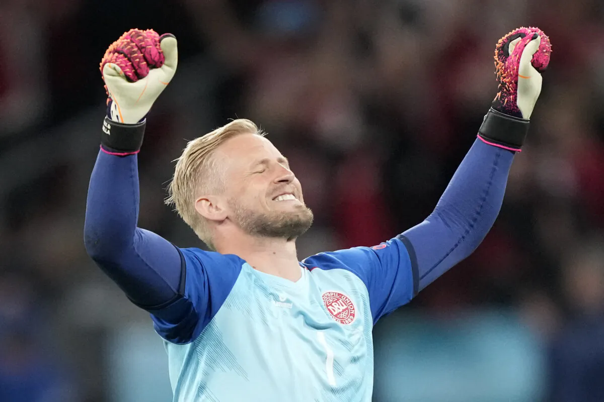Denmark's goalkeeper Kasper Schmeichel celebrates at the end of the UEFA EURO 2020 Group B football match between Russia and Denmark at Parken Stadium in Copenhagen, Denmark, on June 21, 2021. (Martin Meissner/Pool/AFP via Getty Images)