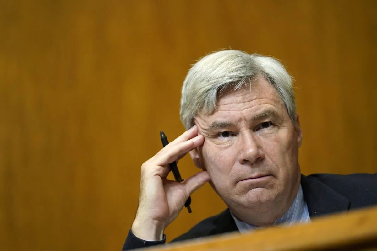 Sen. Sheldon Whitehouse (D-R.I.) listens during a hearing on Capitol Hill in Washington on Feb. 25, 2021. (Susan Walsh/Pool/Getty Images)