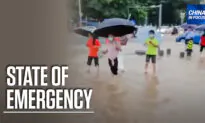 Southern Chinese City Faces Flooding, Virus Spread