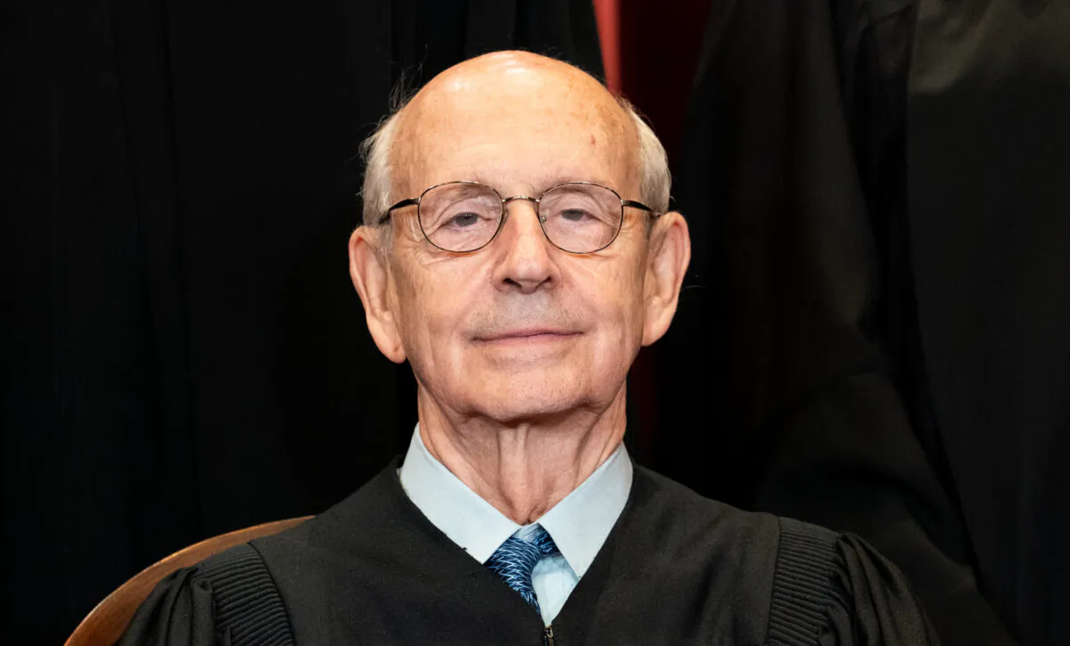 Associate Justice Stephen Breyer sits during a group photograph of the justices at the Supreme Court on April 23, 2021. (Erin Schaff-Pool/Getty Images)