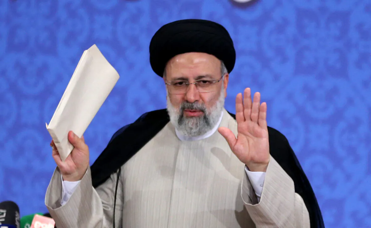 Iran's President-elect Ebrahim Raisi speaks during his first press conference in Tehran on June 21, 2021. The hard-line cleric was declared the winner of Iran's election, replacing moderate Hassan Rouhani. (Atta Kenare/AFP via Getty Images)