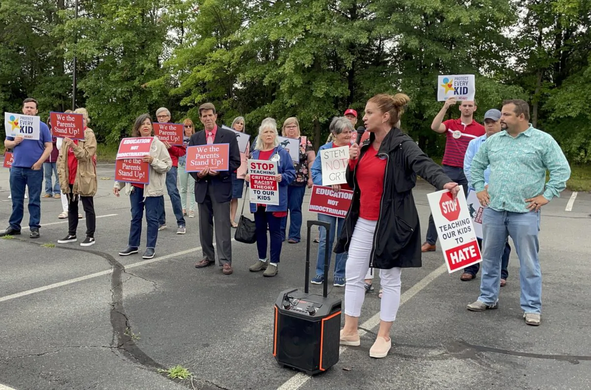 Patti Hidalgo Menders speaks at a rally outside the Loudoun County Public School administration building in Ashburn, Va., on Jun. 22, 2021. (Terri Wu/The Epoch Times)