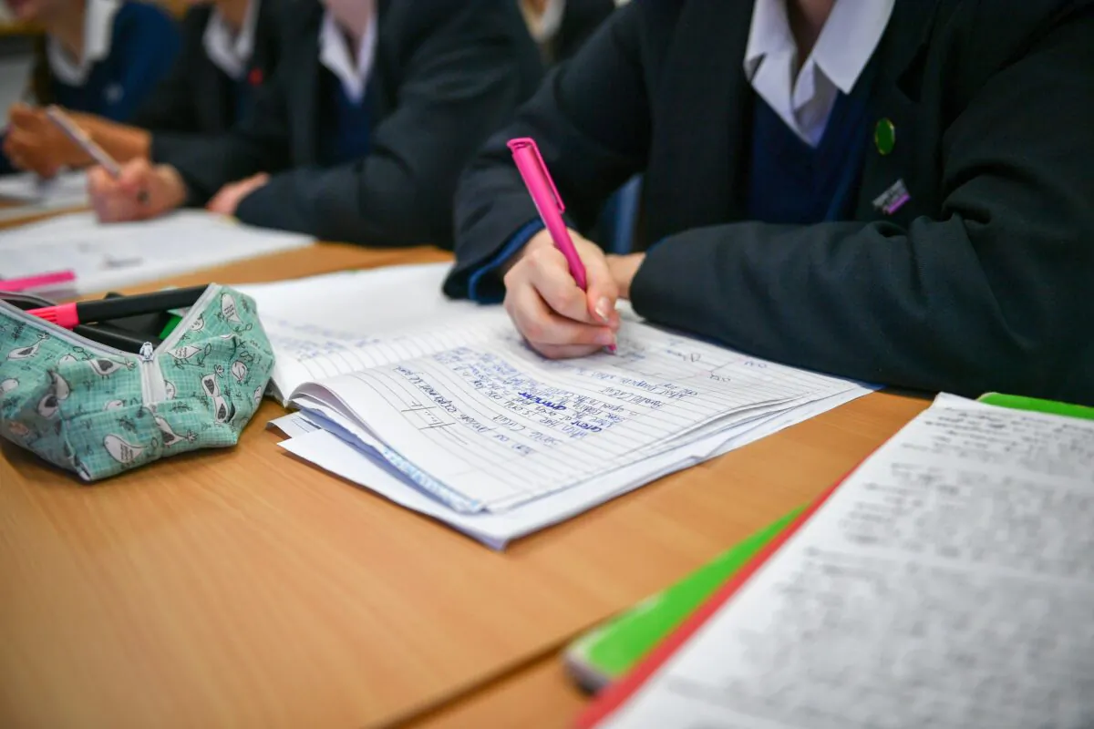 Pupils working in class in an undated photo. (Ben Birchall/PA)