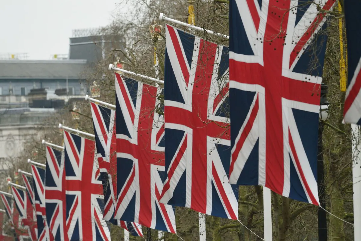 Flags line The Mall leading to Buckingham Palace in an undated photo. (PA)