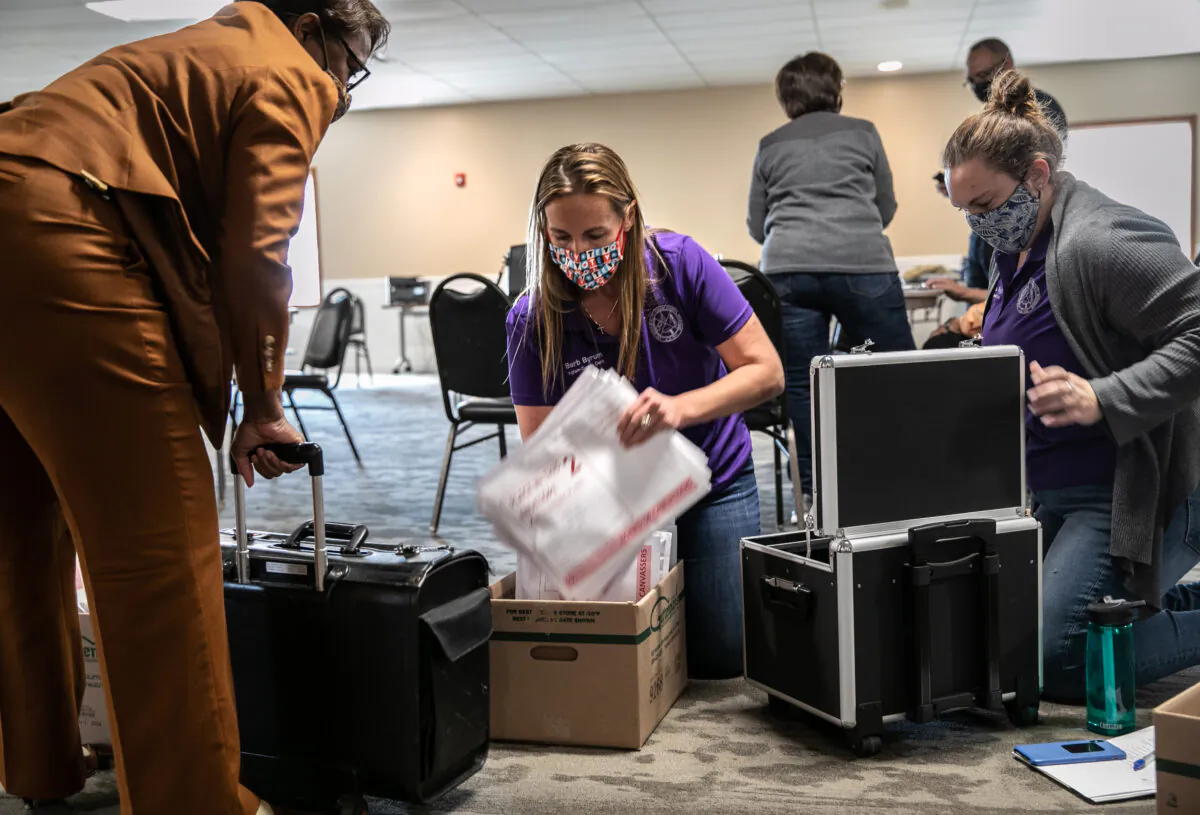 Ingham County Clerk Barb Byrum handles ballot tabulations in Mason, Mich., on Nov. 4, 2020. (John Moore/Getty Images)