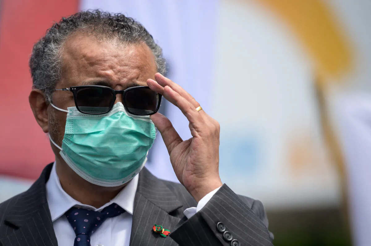 World Health Organization (WHO) Director-General Tedros Adhanom Ghebreyesus adjusts his glasses during a meeting in front of the WHO headquarters in Geneva on May 29, 2021. (Fabrice Coffrini/AFP via Getty Images)