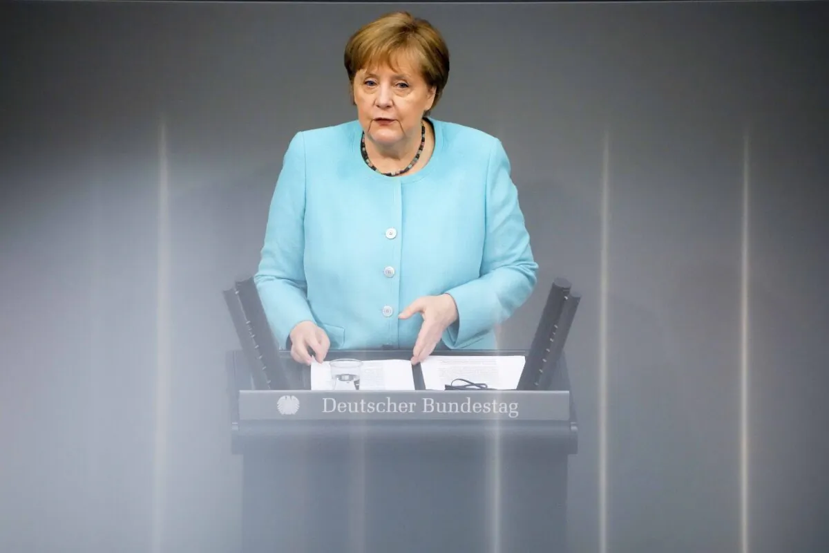 German Chancellor Angela Merkel delivers her speech ahead of an EU summit at the German Bundestag in Berlin, Germany, on June 24, 2021. (Markus Schreiber/AP Photo)
