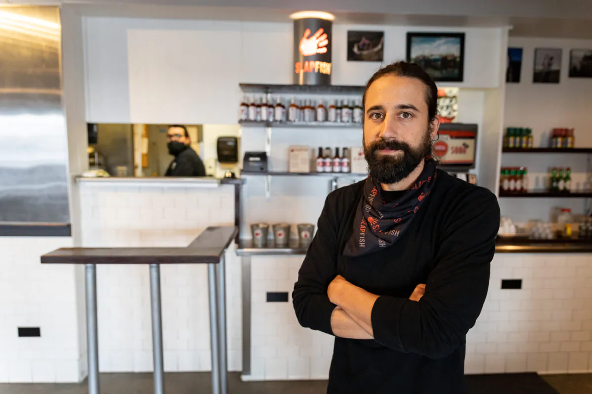 Andrew Gruel, cofounder and executive chef at Slapfish restaurant, is pictured in Huntington Beach, Calif., on June 7, 2021. (John Fredricks/The Epoch Times)