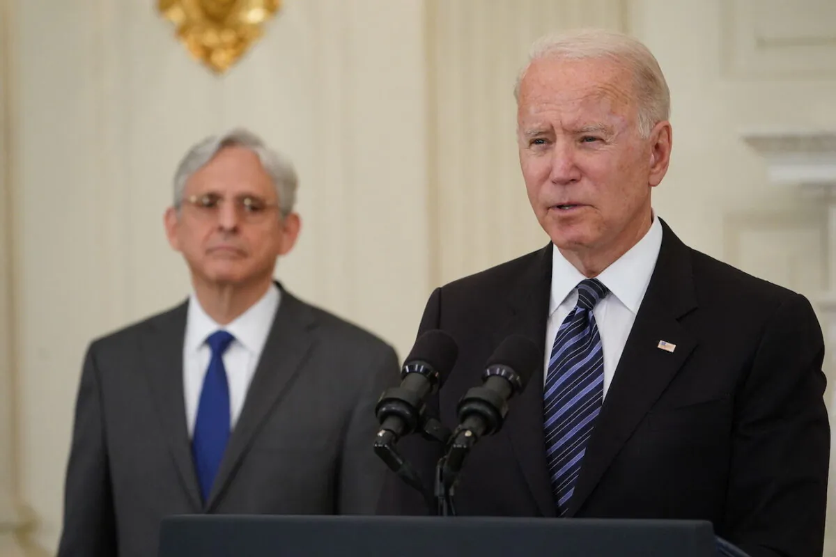 Attorney General Merrick Garland looks on as President Joe Biden speaks about crime prevention at the White House in Washington, on June 23, 2021. (Mandel Ngan/AFP via Getty Images)