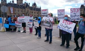 Uyghur Protesters Rally at Parliament Hill as Part of Global Effort Against Beijing Winter Olympics 2022
