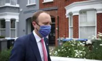 UK Health Minister ‘Very Sorry’ After Pictured Kissing Aide