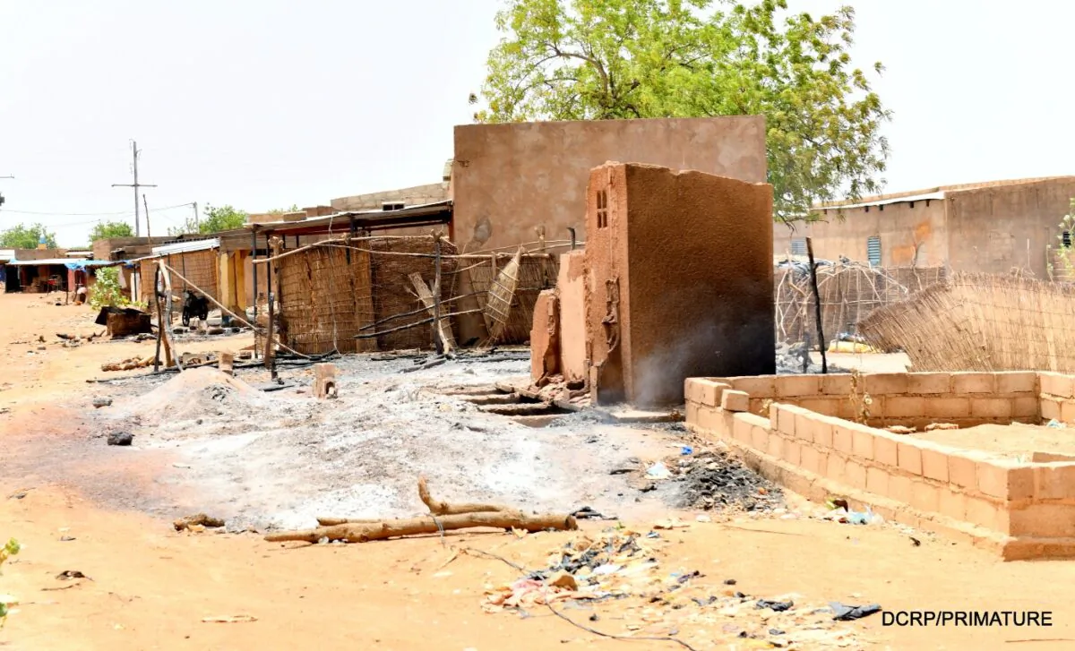 A view shows damaged buildings and huts at the site of an attack in the village of Solhan, in Yagha province bordering Niger, Burkina Faso, on June 7, 2021. (Burkina Faso Prime Minister's Press Service/Handout via Reuters)