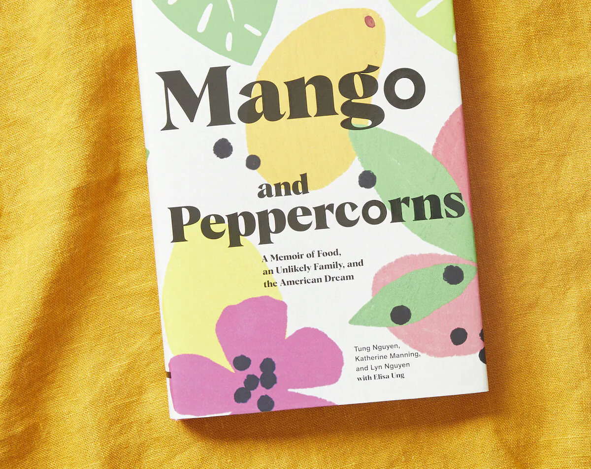 "Mango and Peppercorns," a new part-memoir, part-cookbook from the women behind Hy Vong in Miami. (Courtesy of Chronicle Books)