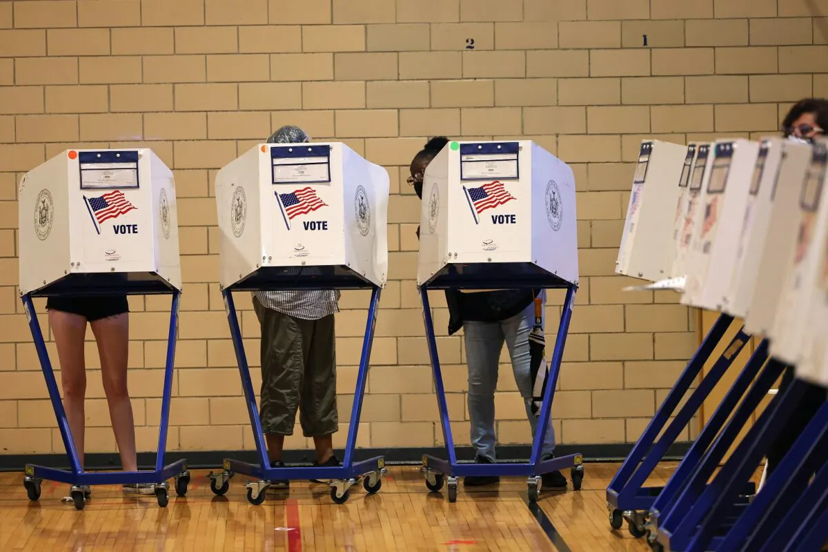 People vote on Primary Election Day in the Flatbush neighborhood of Brooklyn borough, N.Y., on June 22, 2021. (Michael M. Santiago/Getty Images)