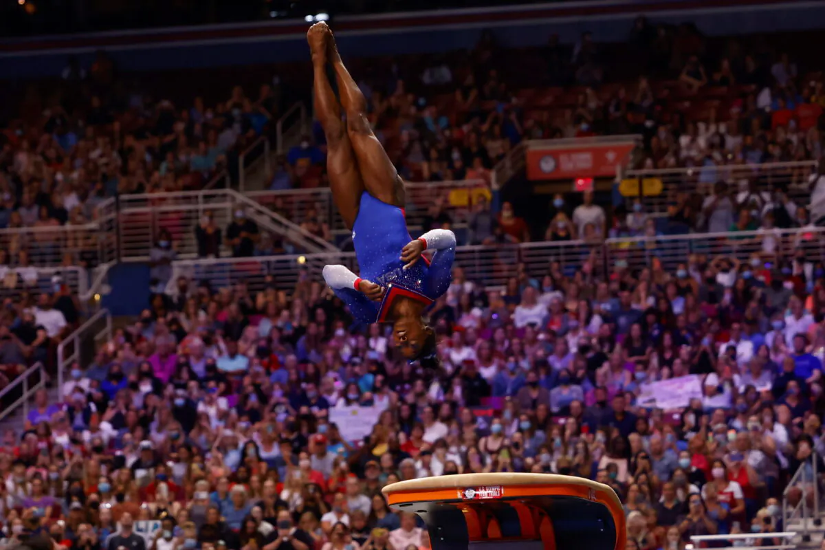 Simone Biles competes on the vault at the U.S. Women's Olympic Gymnastics trials in St Louis, Missouri, U.S., on June 25, 2021. (Lindsey Wasson/Reuters)