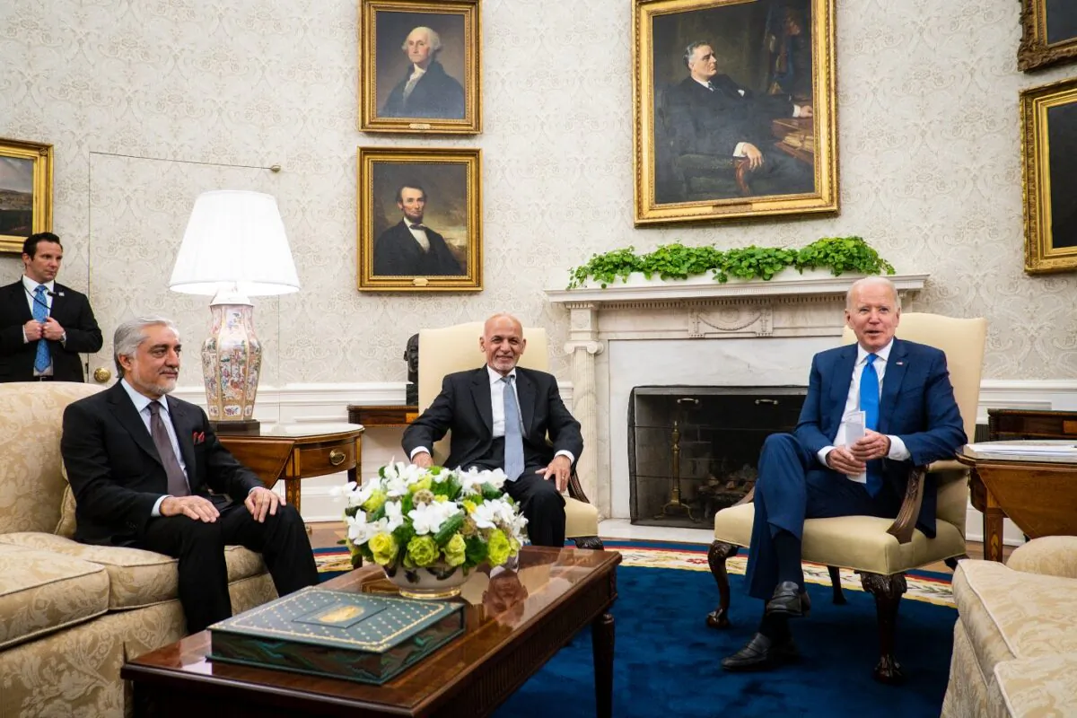 President Joe Biden (R) hosts Afghanistan President Ashraf Ghani (C) and Dr. Abdullah Abdullah, Chairman of the High Council for National Reconciliation, in the Oval Office at the White House in Washington, on June 25, 2021. (Pete Marovich/Pool/Getty Images)