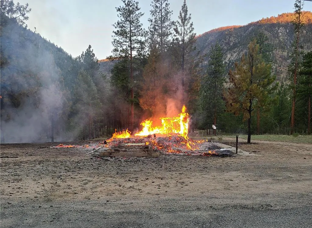 The burning remains of a church are shown in Chopaka, B.C. in a handout photo taken on June 26, 2021. （The Canadian Press/Chief Keith Crow）

