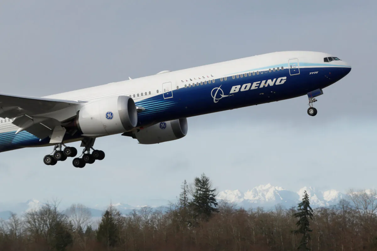 A Boeing 777X airplane takes off during its first test flight from the company's plant in Everett, Wash., on Jan. 25, 2020. (Terray Sylvester/Reuters)
