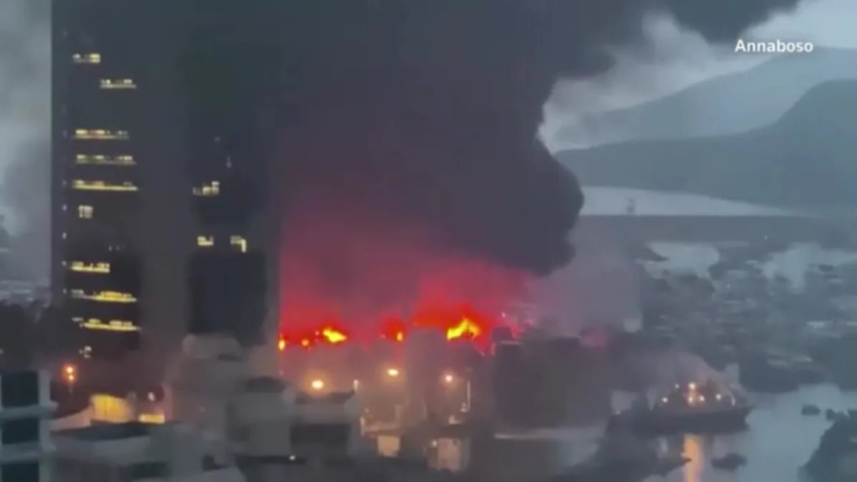 Fire and thick black smoke at the Aberdeen South typhoon shelter in Hong Kong on June 27, 2021. (Courtesy of Annabonso via Reuters/Screenshot via The Epoch Times)