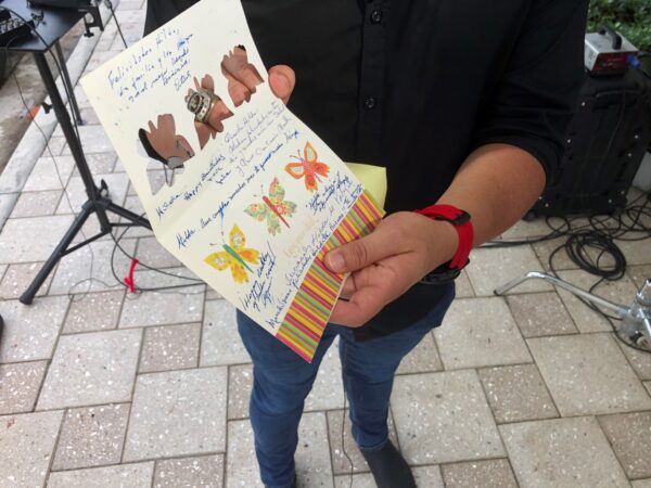 man-shows-birthday-card