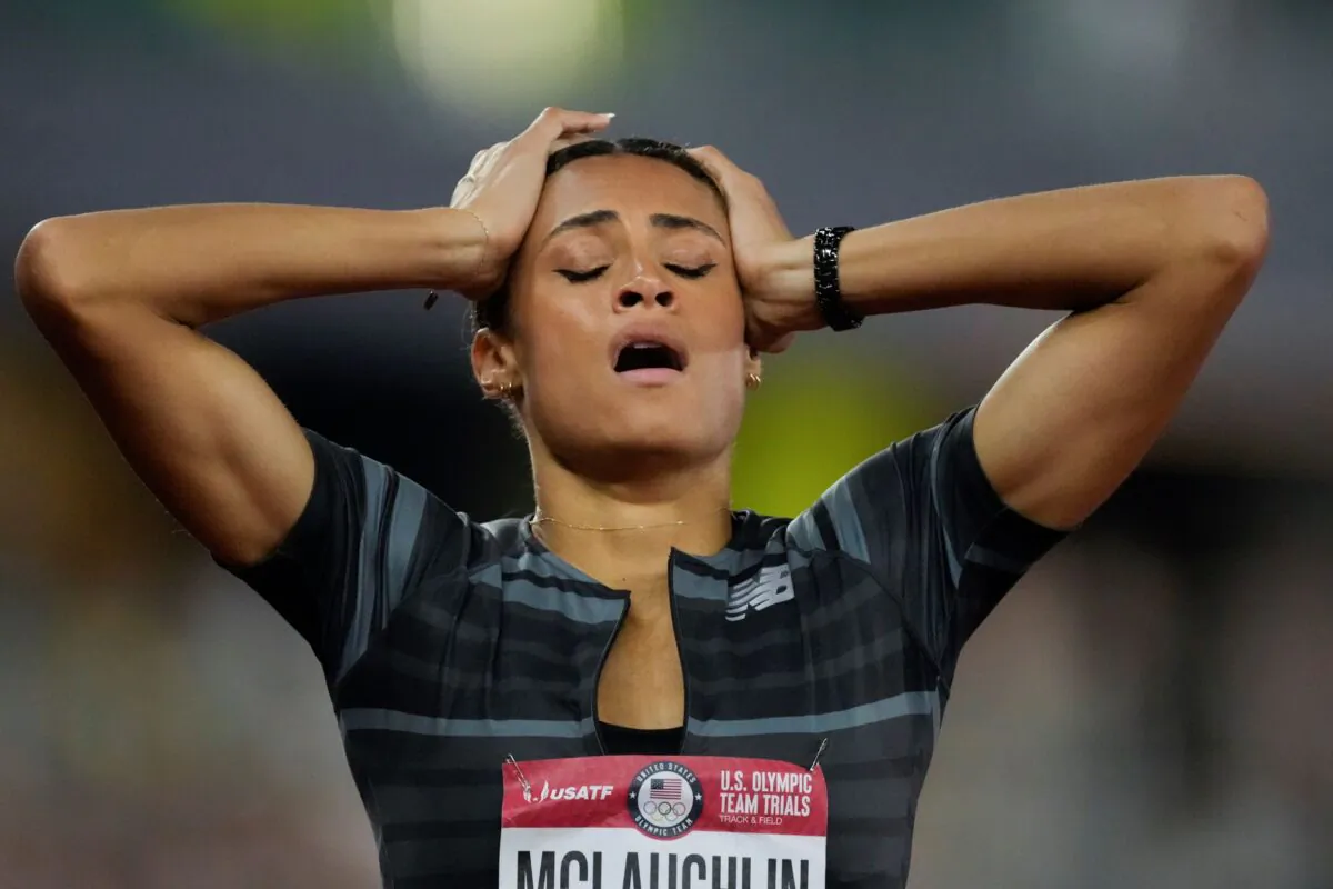 Sydney McLaughlin reacts after setting a new world record in the finals of the women's 400-meter hurdles at the U.S. Olympic Track and Field Trials in Eugene, Ore., on June 27, 2021. (Ashley Landis/AP Photo)
