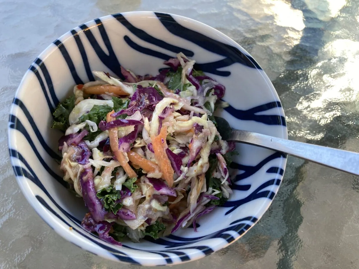 Everything about this light, almost mayo-free slaw is understated, like the creator of the original secret sauce. And that’s why it works. (Ari LeVaux)