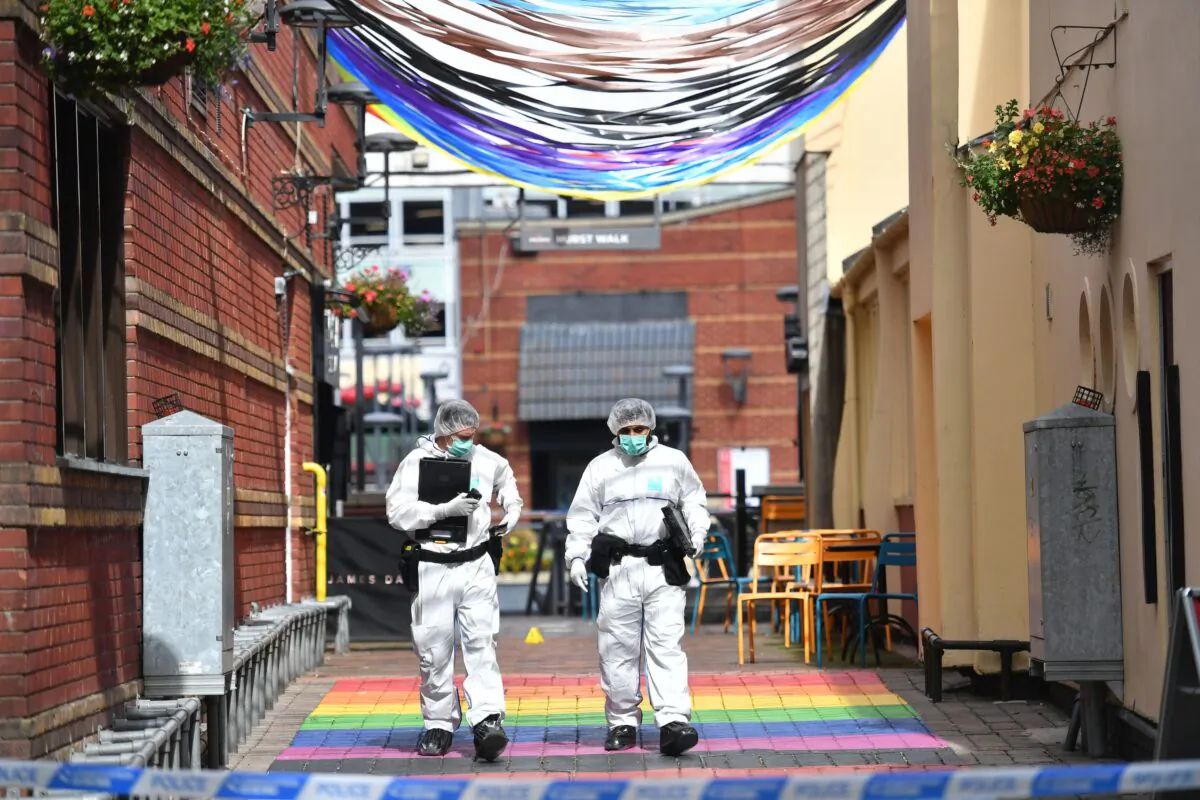 PABEST Police forensic officers in Hurst Walk in Birmingham, UK, on Sept 6, 2020. (Jacob King/PA)