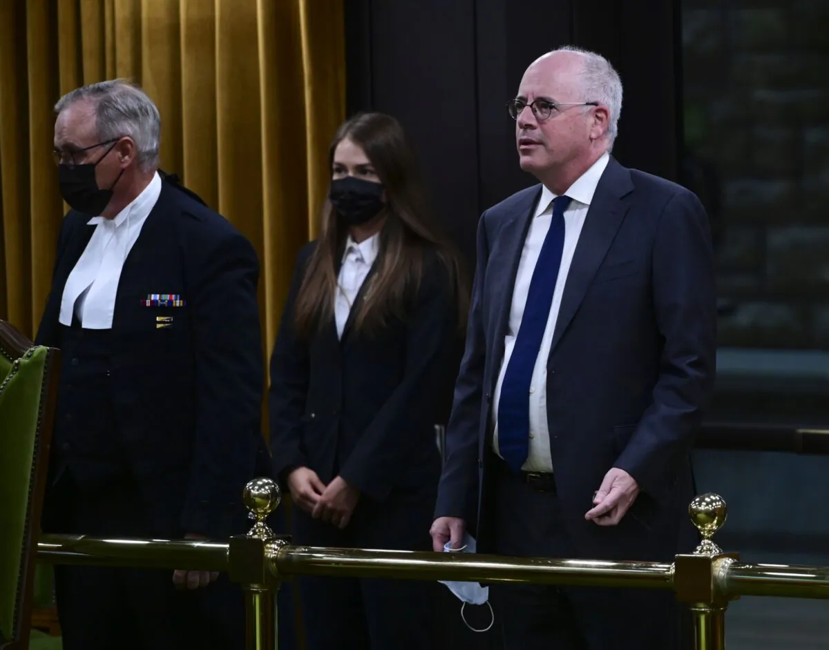 Public Health Agency of Canada President Iain Stewart (R) approaches the bar in the House of Commons to be admonished by House Speaker Anthony Rota on Parliament Hill in Ottawa on June 21, 2021. (The Canadian Press/Sean Kilpatrick)