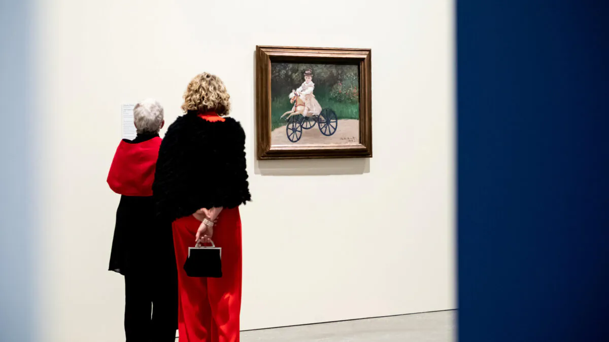 Visitors contemplating European Masterpieces from The Metropolitan Museum of Art, New York (Chloë Callistemon/QAGOMA).