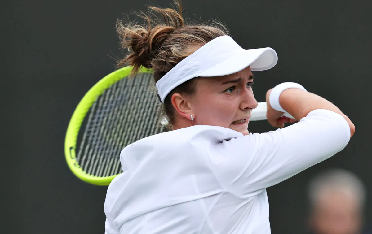 Barbora Krejcikova of The Czech Republic plays a forehand in her Ladies' Singles First Round match against Clara Tauson of Denmark during Day Two of The Championships-Wimbledon 2021 at the All England Lawn Tennis and Croquet Club in London, England, on June 29, 2021. (Clive Brunskill/Getty Images)