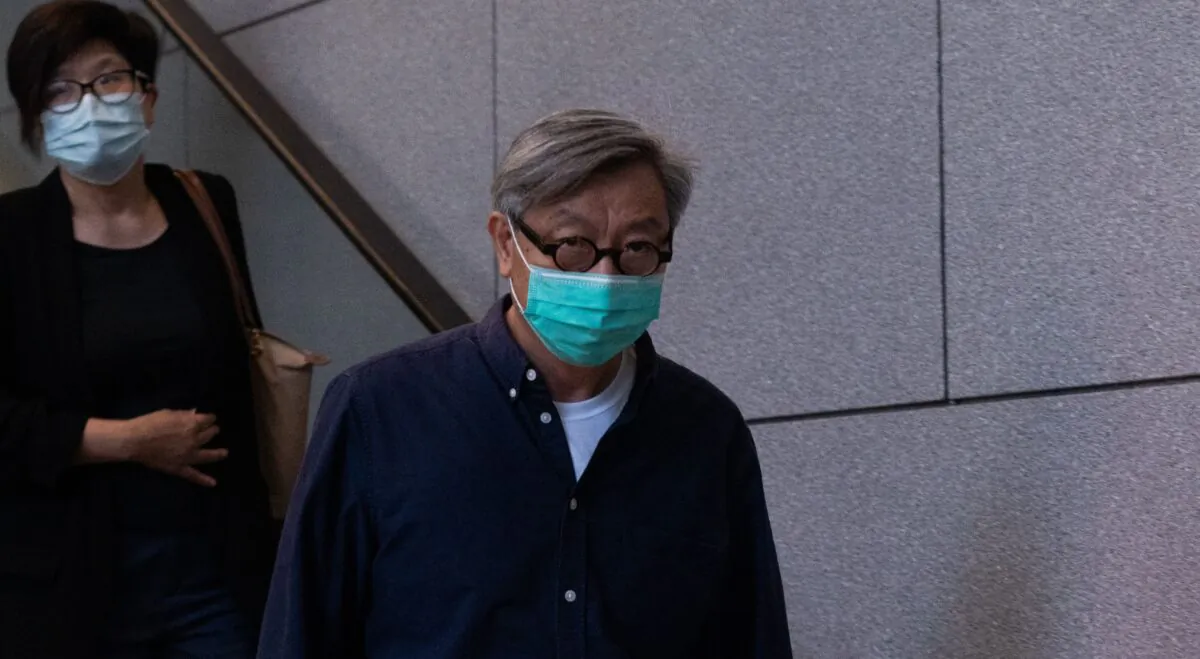 Fung Wai-kong, managing editor and chief opinion writer for shuttered pro-democracy newspaper Apple Daily's English website, who wrote under the pen-name Lo Fung, leaves the police headquarters in Hong Kong on June 29, 2021, after he was released on bail following his arrest under the National Security Law. (Bertha Wang/AFP via Getty Images)