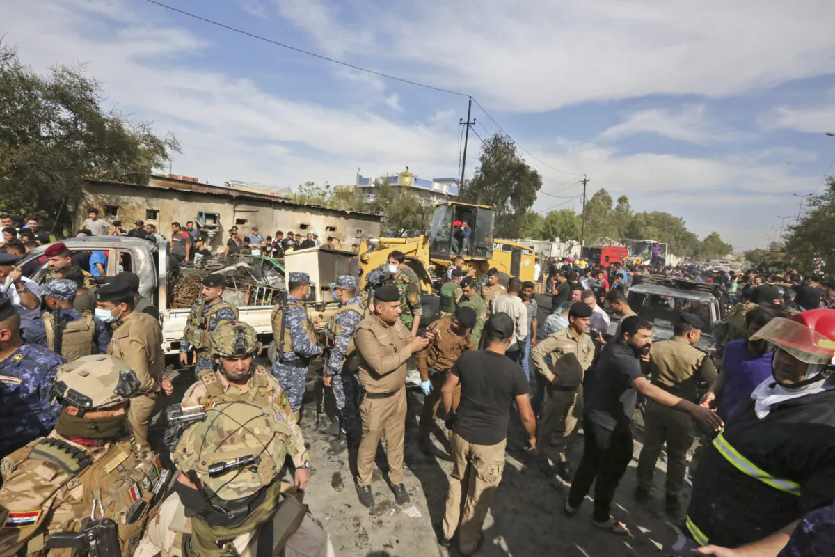 Members of the Iraqi army and security forces at the Sadr City suburb of Iraq's capital Baghdad in a file photo. (Sabah Arar/AFP via Getty Images)